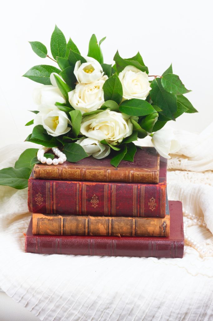 Old books with flowers